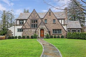 22 Griswold Road Rye, NY 10580 - Photo 1 of 1 a front view of a house with a yard