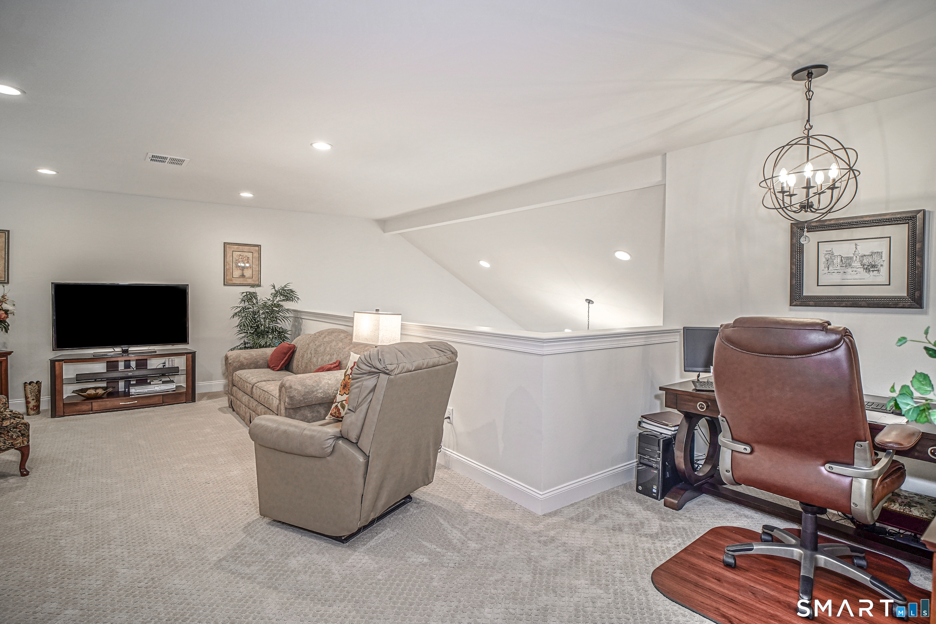 28 Tamarack Court, Unit 28 Prospect, CT 06712 - Photo 26 of 40 Upper-level family room with home office space