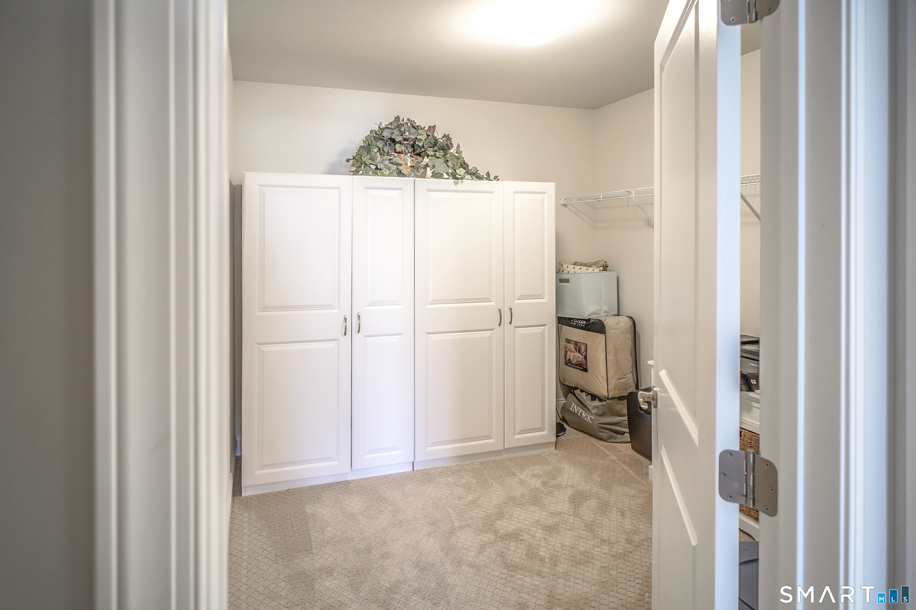 28 Tamarack Court, Unit 28 Prospect, CT 06712 - Photo 29 of 40 Additional finished room 9 x 9 with versatile use of storage, attic space, walk-in closet, or small guest bedroom.