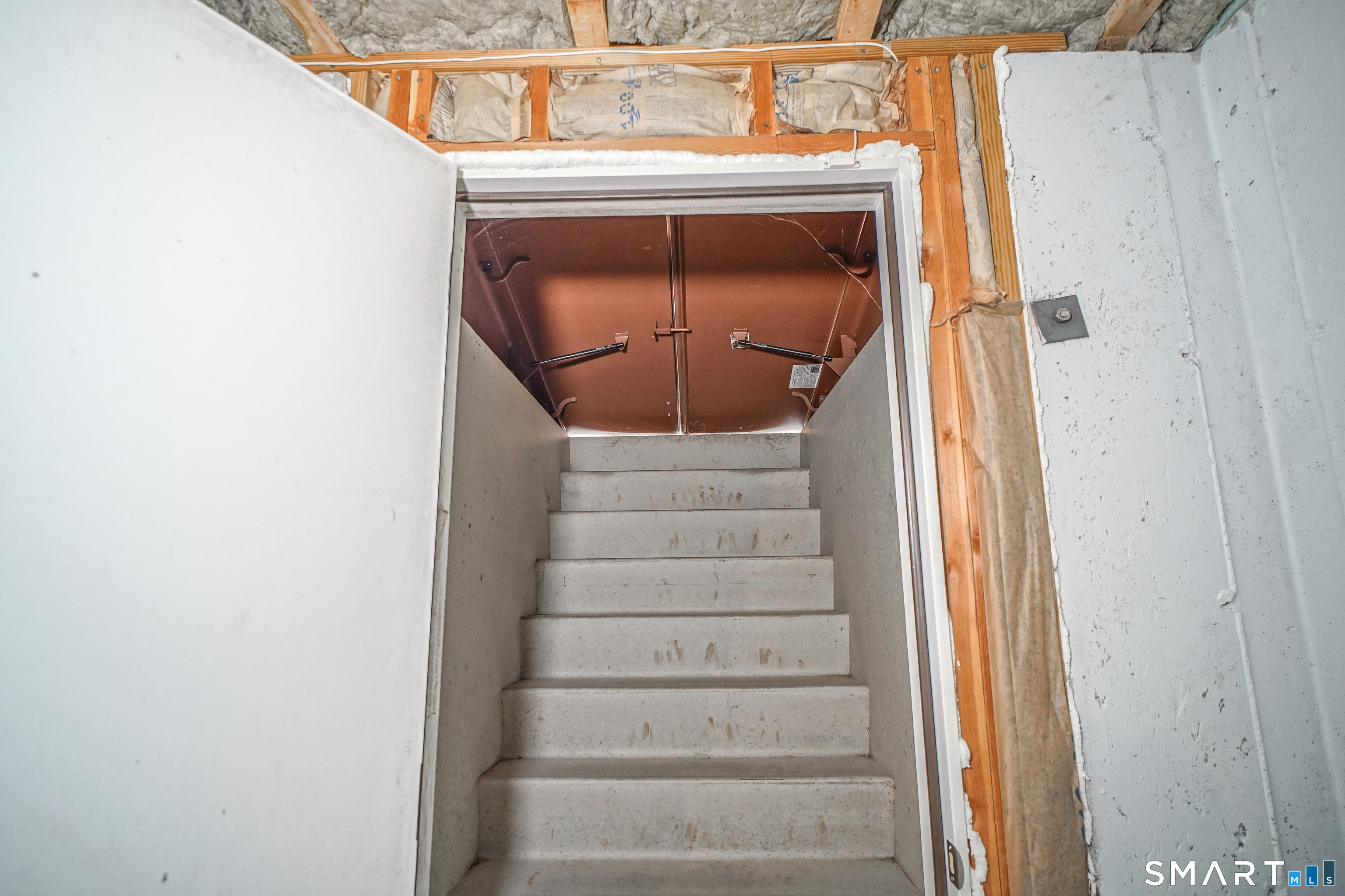 28 Tamarack Court, Unit 28 Prospect, CT 06712 - Photo 31 of 40 Basement doors designed to lead to stairs that connect the basement to the backyard.