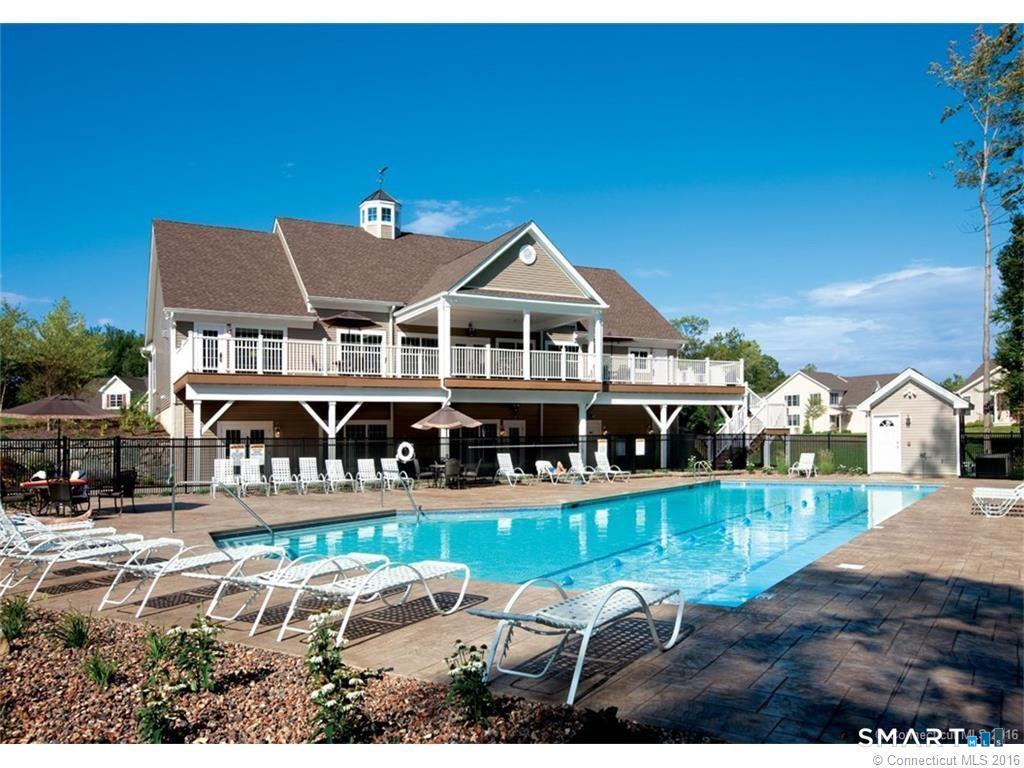 28 Tamarack Court, Unit 28 Prospect, CT 06712 - Photo 36 of 40 Resort-Style Pool: A beautiful outdoor swimming pool and sundeck perfect for summer relaxation. Active Sports: Competition-ready tennis courts, two bocce ball courts, and a professional putting green.