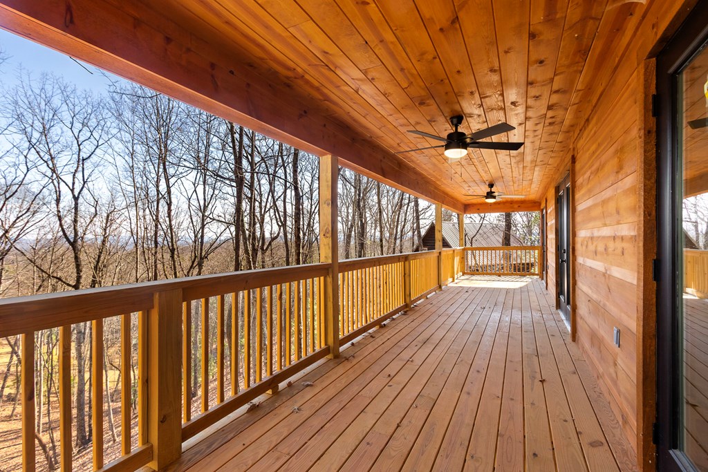 87 Tuscarora Trail Murphy, NC 28906 - Photo 36 of 74 a view of balcony with wooden floor
