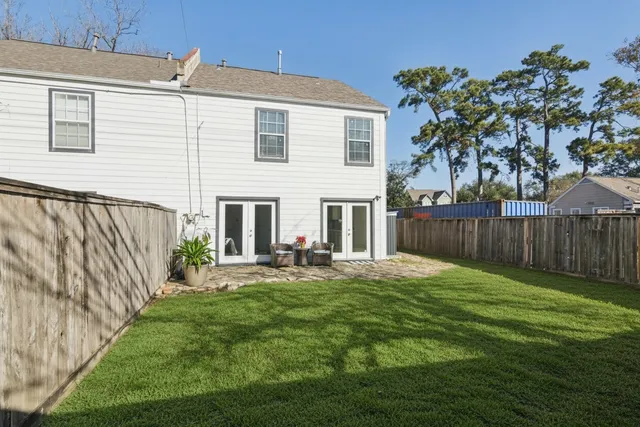 a front view of house with yard and seating area