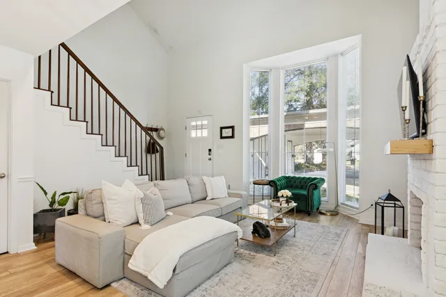 a living room with furniture or couch and a flat screen tv