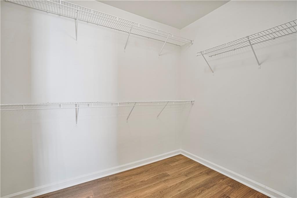 1938 Dilcrest Drive Duluth, GA 30096 - Photo 20 of 32 a view of a room with racks on the wall