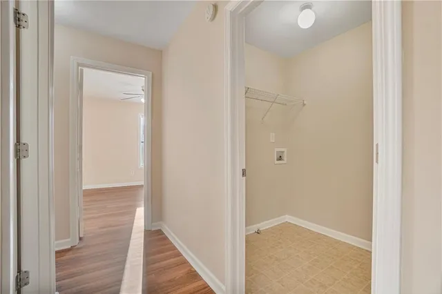 a view of hallway with closet