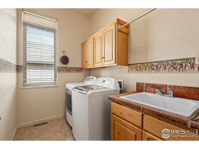 $940,000 | 6535 Half Moon Bay Drive, Windsor, CO 80550