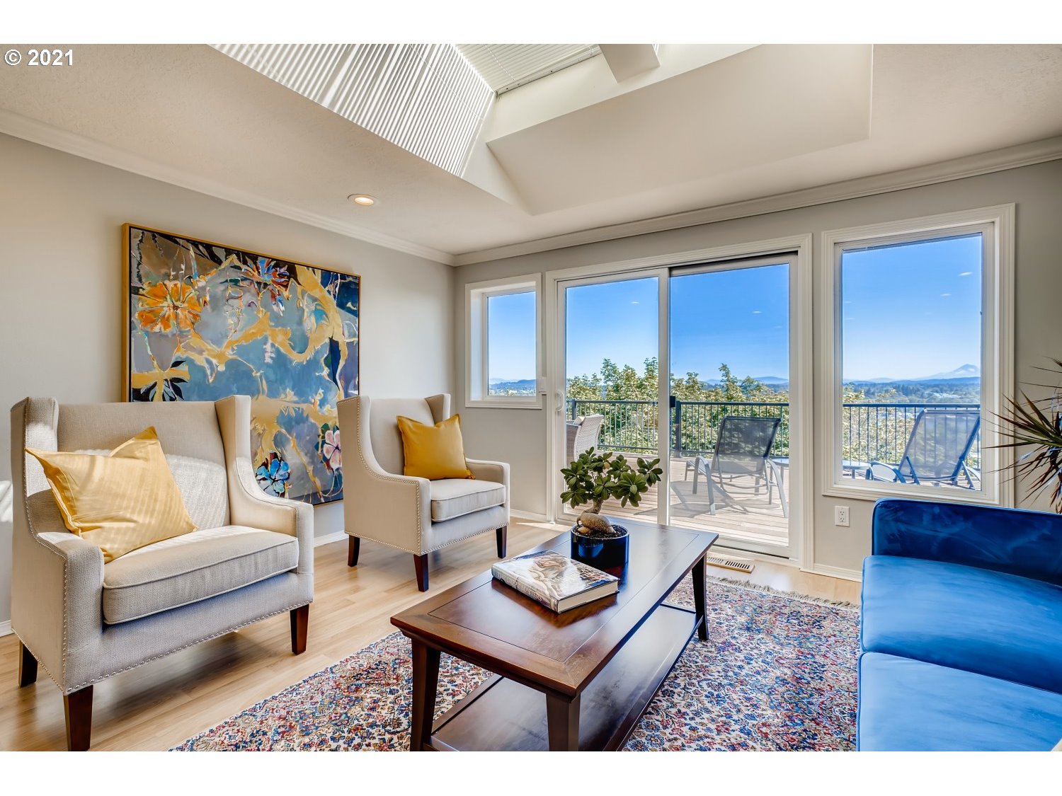 6530 Southwest View Point Terrace Portland, OR 97239 - Photo 12 of 32 a living room with furniture and a large window