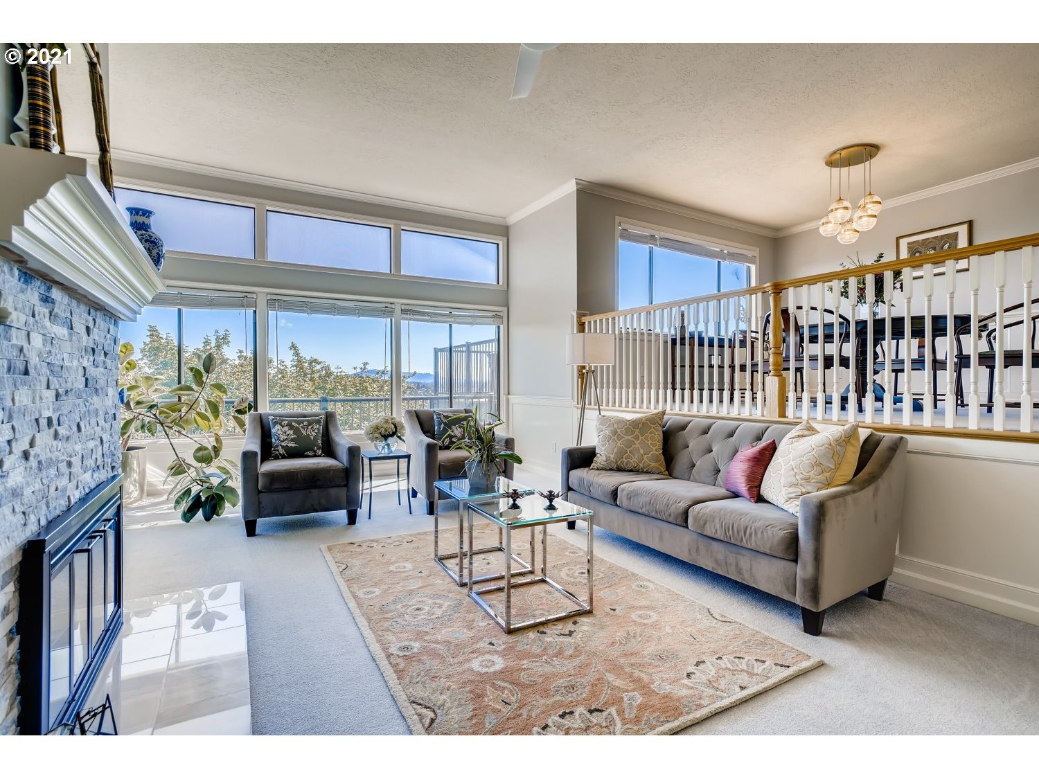6530 Southwest View Point Terrace Portland, OR 97239 - Photo 4 of 32 a living room with furniture and a large window