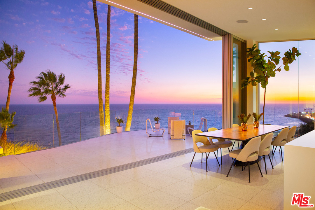 a view of a patio with swimming pool