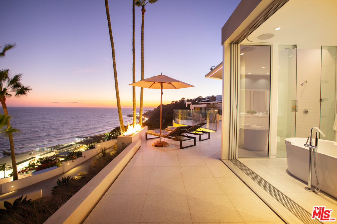 213 Pintoresca Drive Pacific Palisades, CA 90272 - Photo 20 of 23 a view of a balcony with chairs