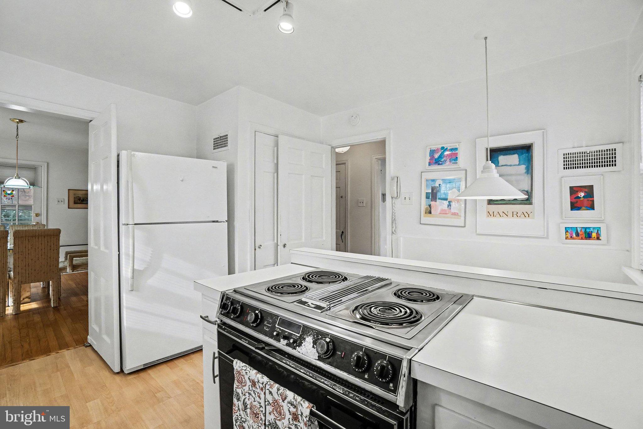 3603 Hillcrest Road Harrisburg, PA 17109 - Photo 12 of 34 a kitchen with a stove and a refrigerator
