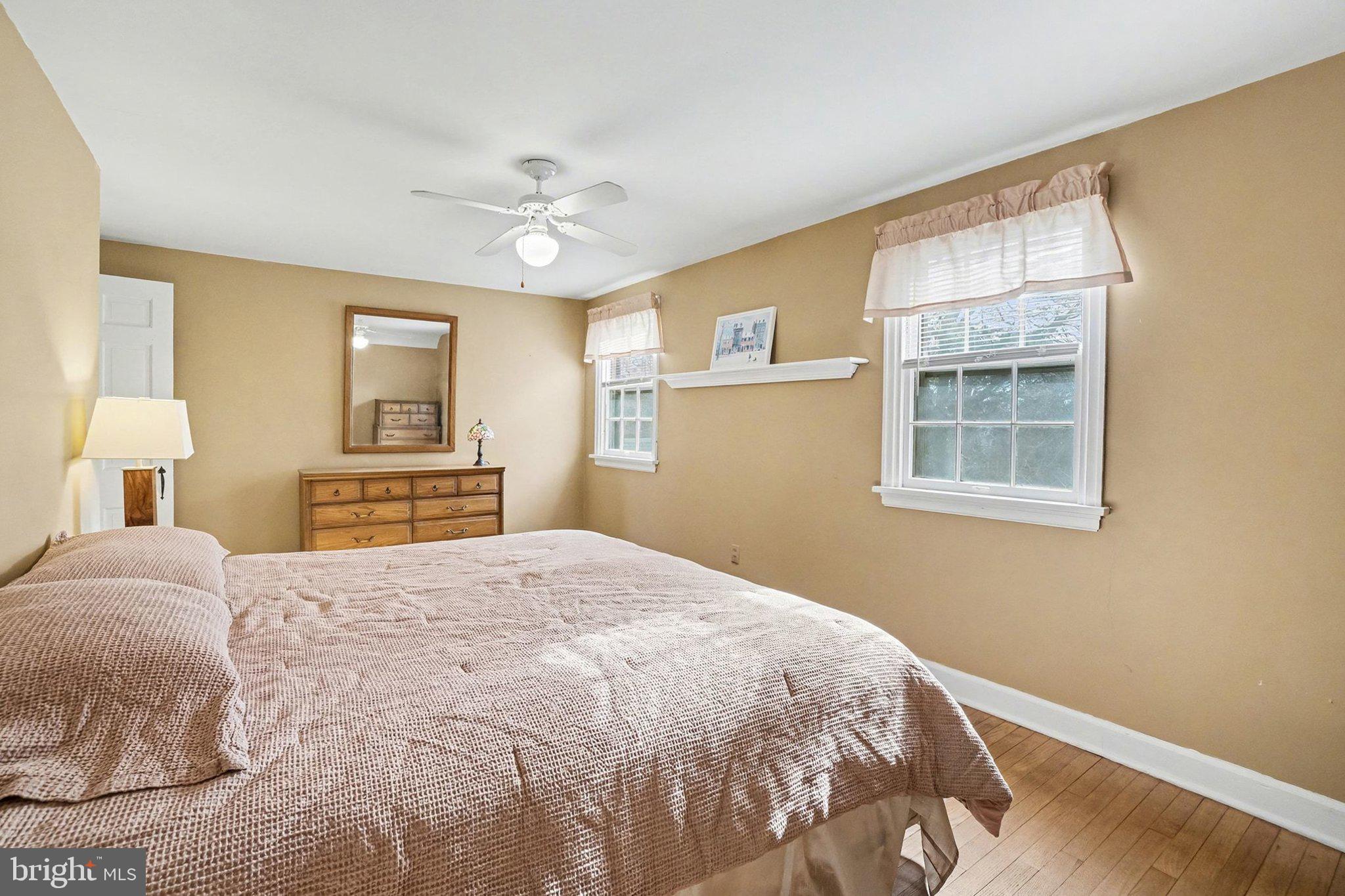 3603 Hillcrest Road Harrisburg, PA 17109 - Photo 18 of 34 a bedroom with a large bed and a window