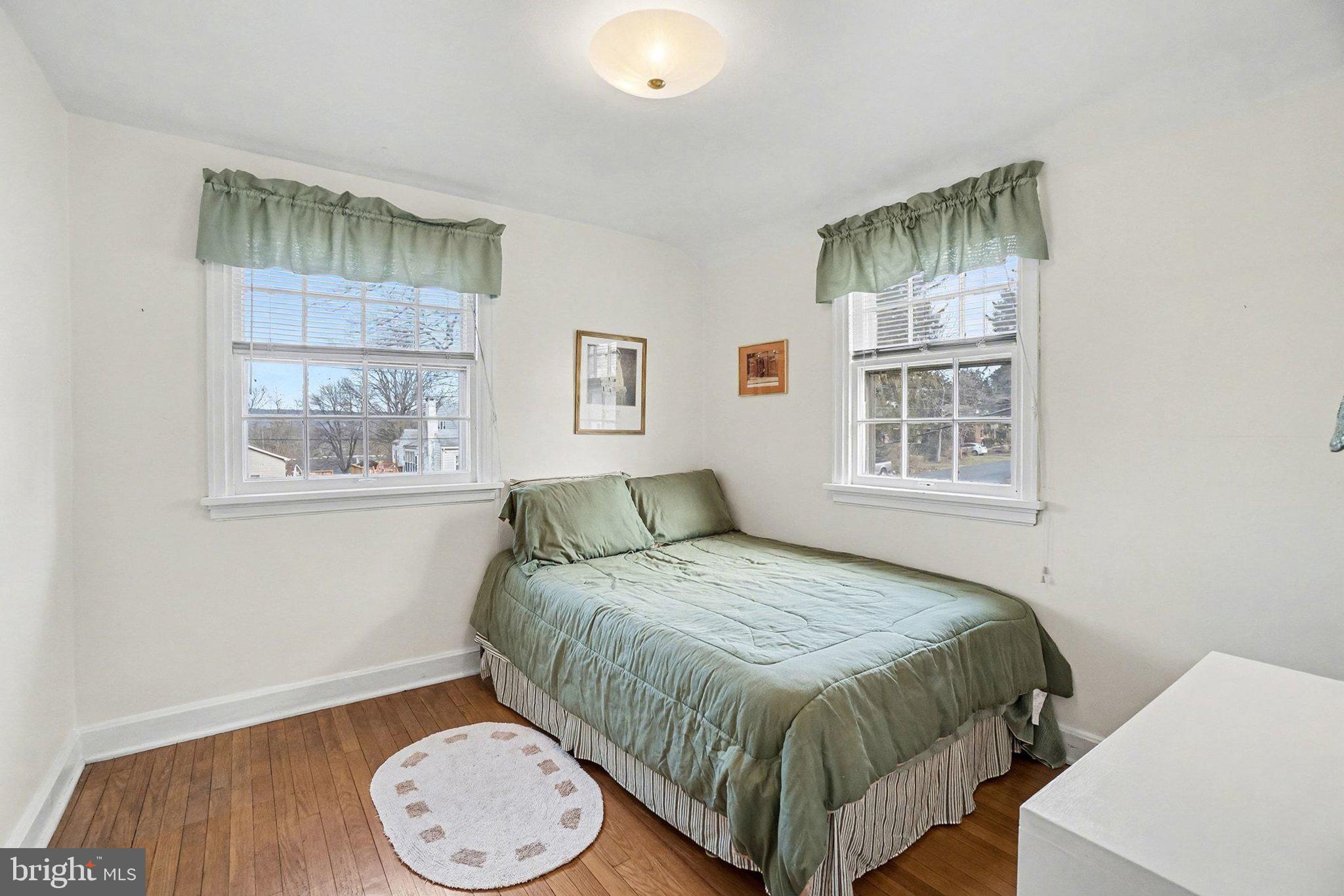 3603 Hillcrest Road Harrisburg, PA 17109 - Photo 20 of 34 a bedroom with a bed and a window