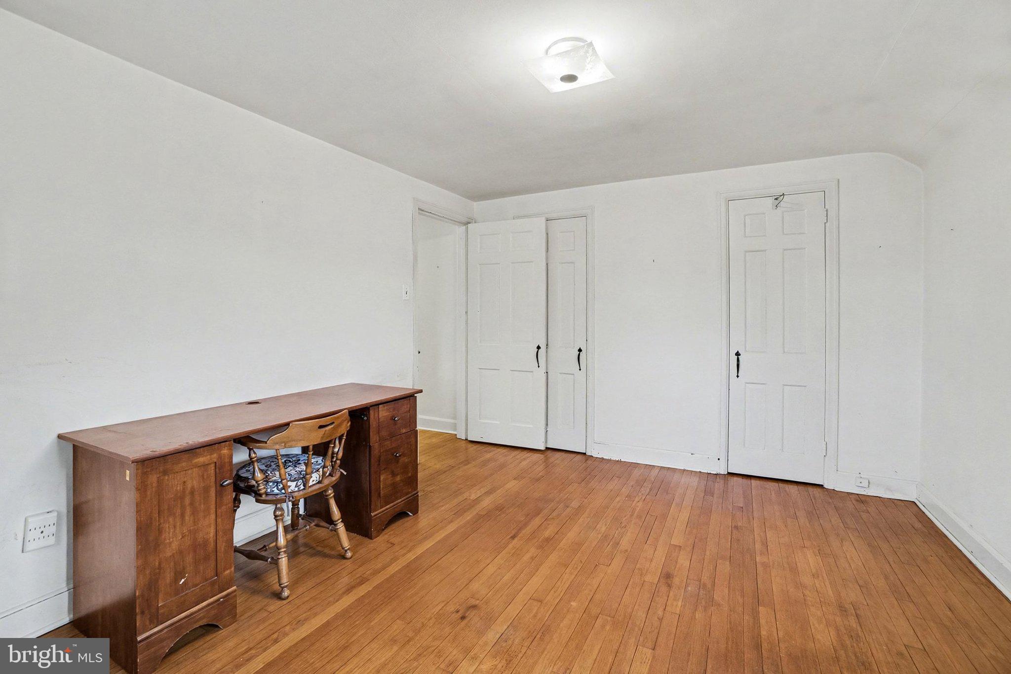 3603 Hillcrest Road Harrisburg, PA 17109 - Photo 23 of 34 a view of a room with wooden floor and furniture