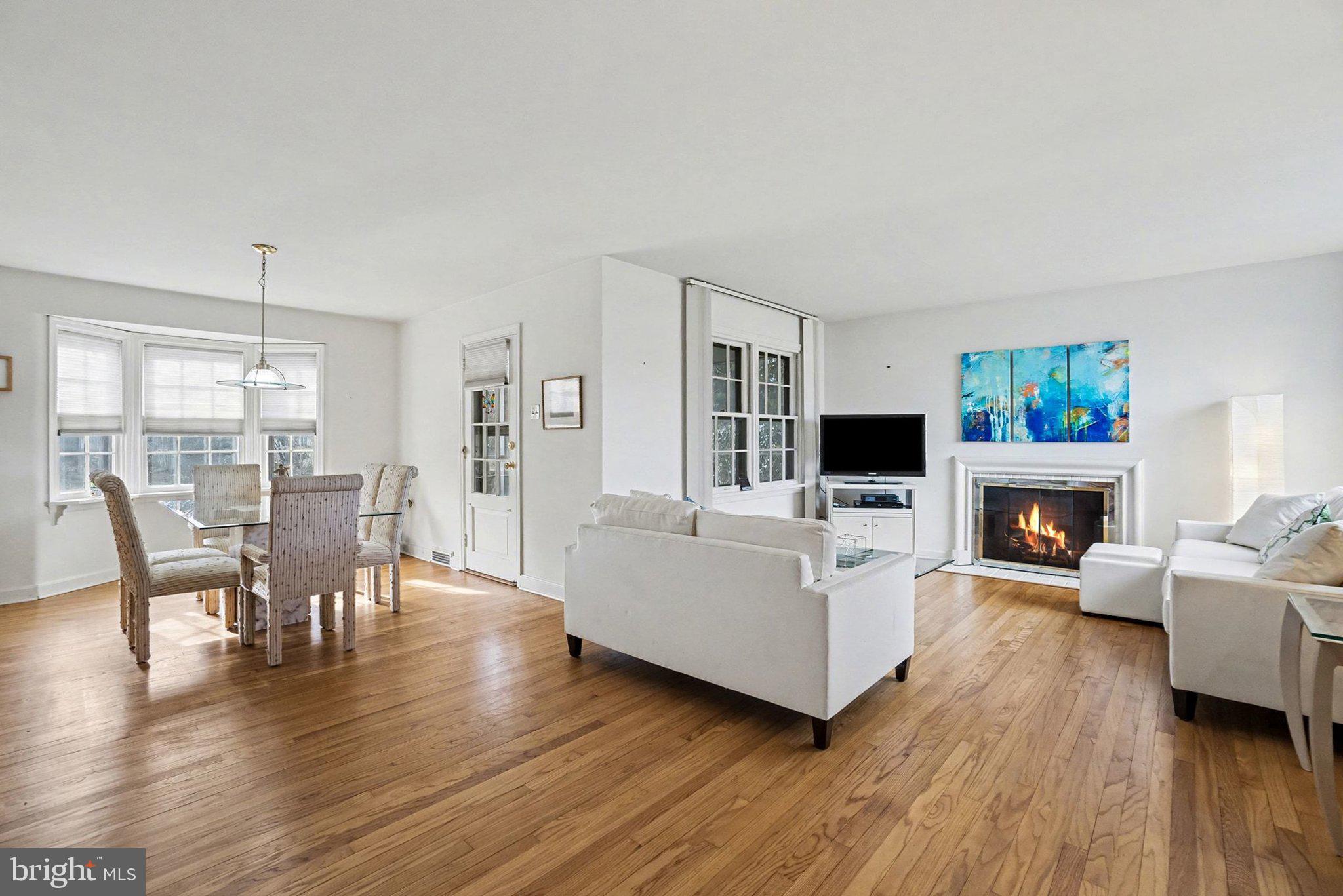 3603 Hillcrest Road Harrisburg, PA 17109 - Photo 5 of 34 a living room with furniture a flat screen tv and a fireplace