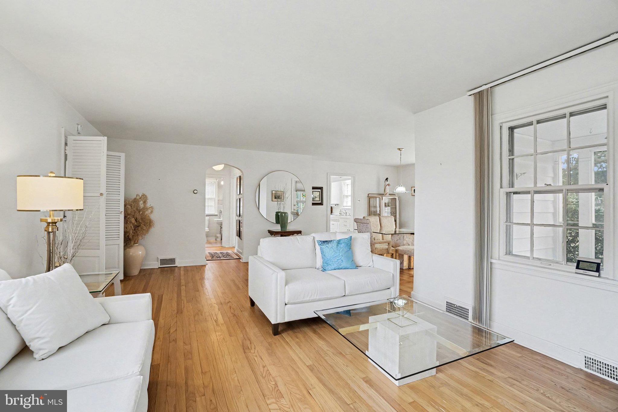3603 Hillcrest Road Harrisburg, PA 17109 - Photo 7 of 34 a living room with furniture and a wooden floor