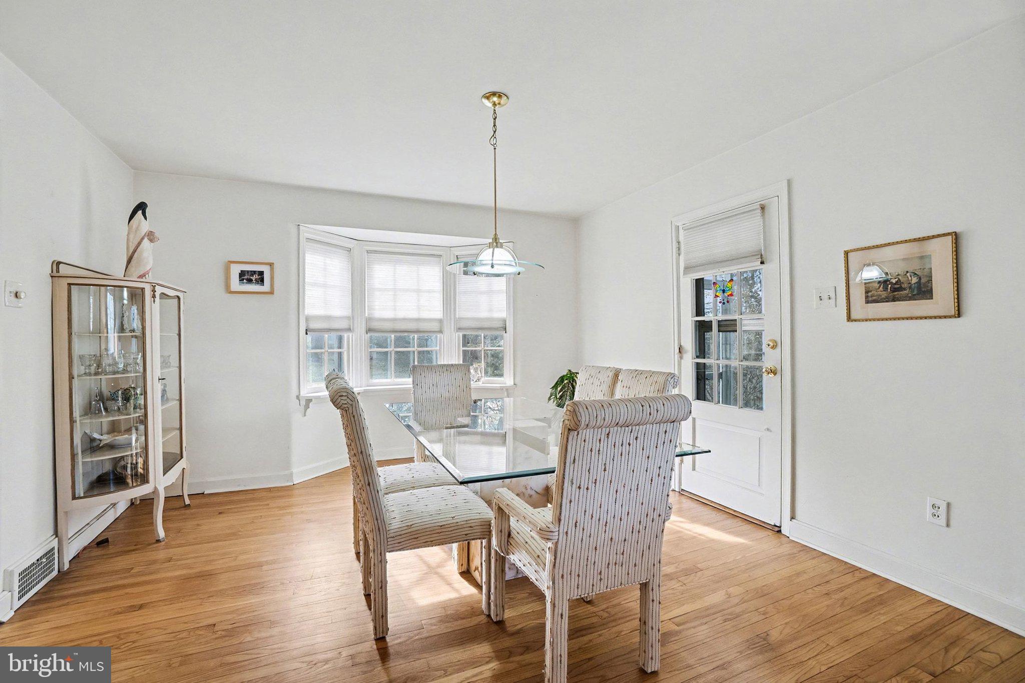 3603 Hillcrest Road Harrisburg, PA 17109 - Photo 8 of 34 a dining room with furniture window wooden floor