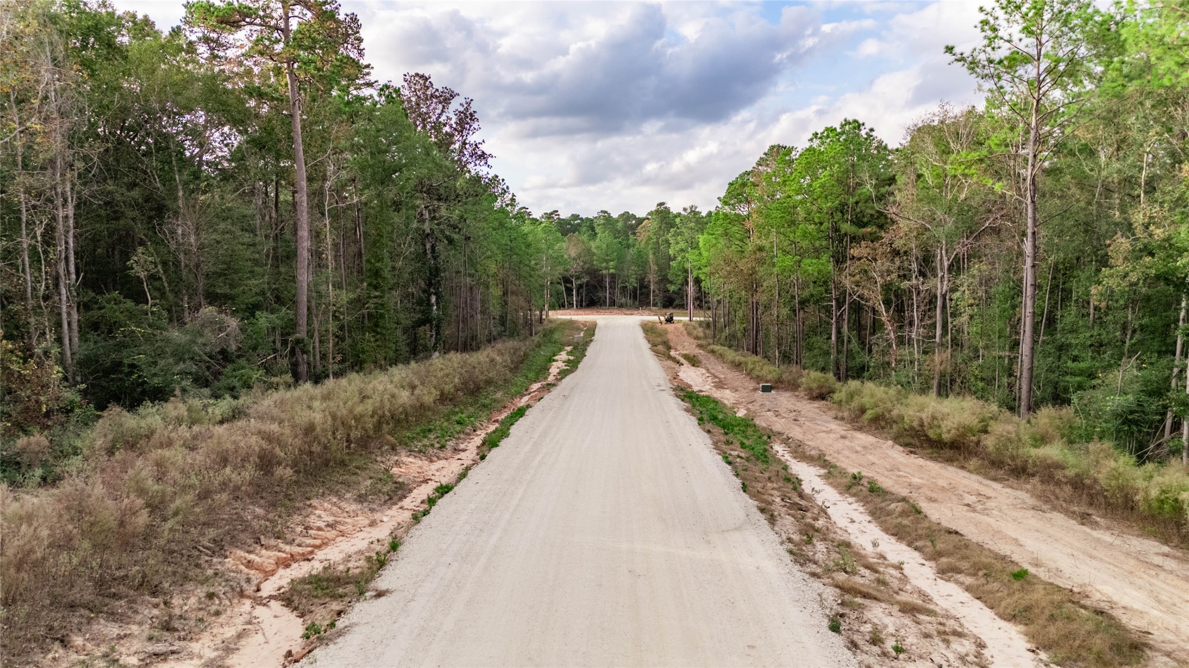 134 Splendid Road New Waverly, TX 77358 - Photo 9 of 17 a view of a pathway with a park