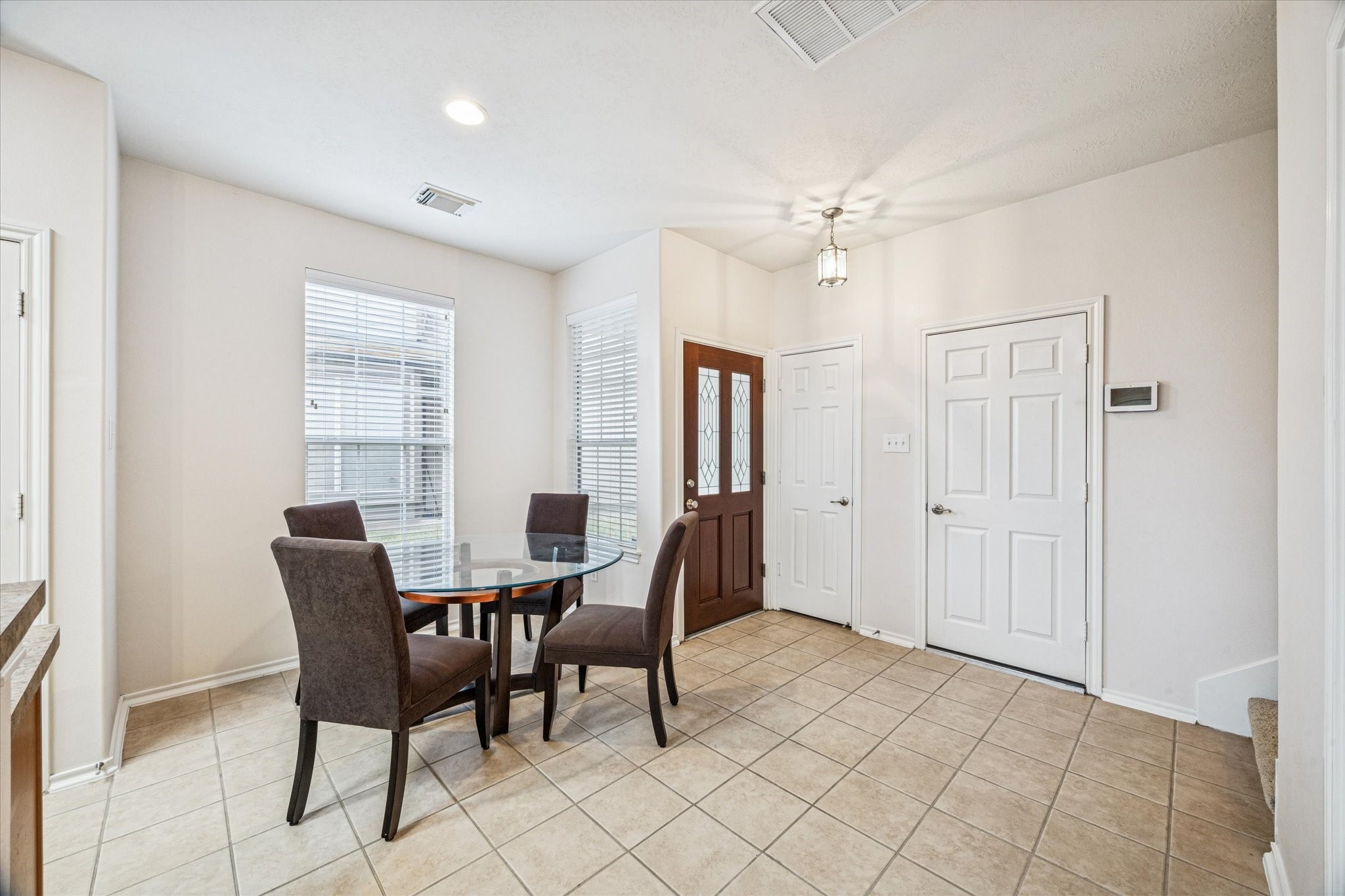 3206 Pearl Bluff Lane Houston, TX 77047 - Photo 3 of 20 a view of a dining room with furniture