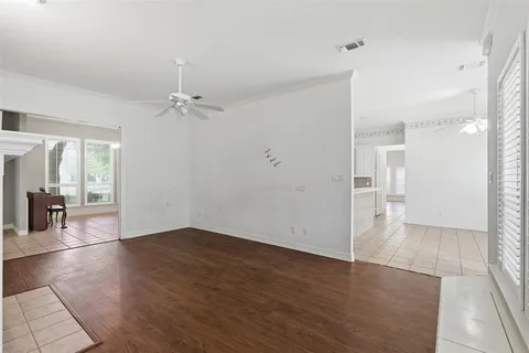 a bathroom with a double vanity sink mirror and shower