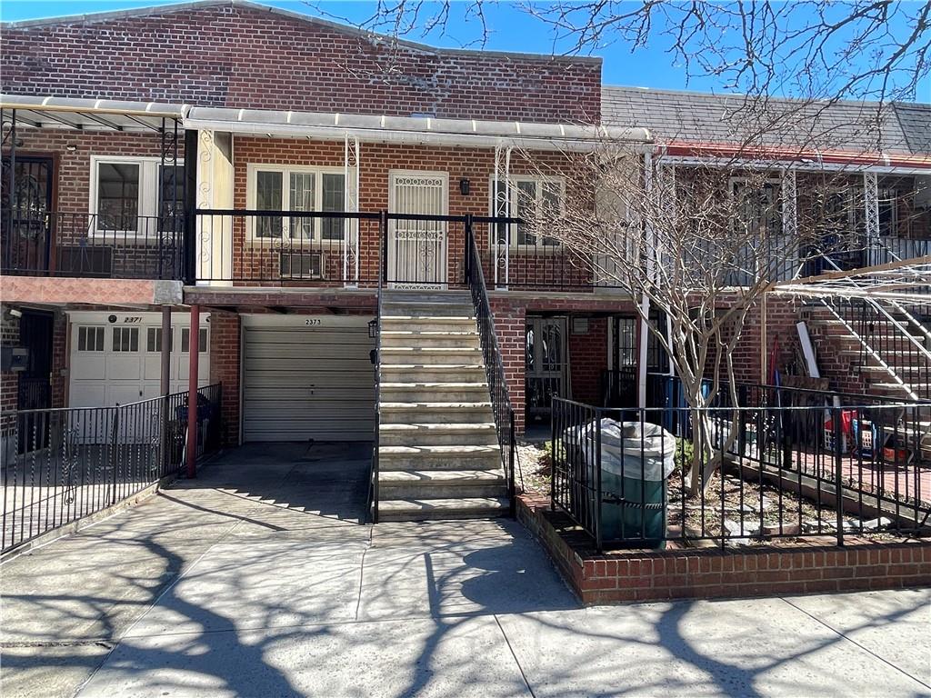 2373 Bragg Street Brooklyn, NY 11229 - Photo 1 of 11 a view of a house with brick walls