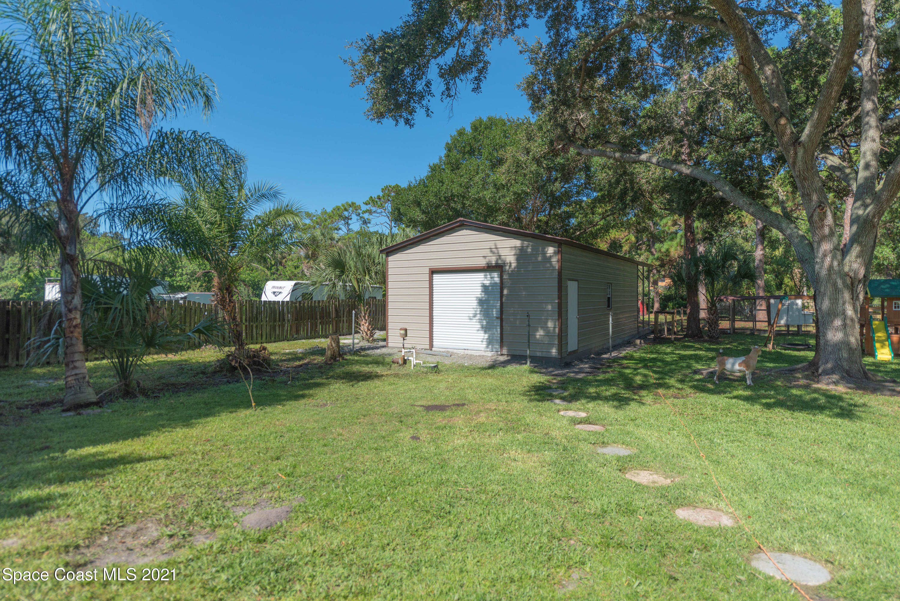 2680 Lakemont Road Melbourne, FL 32934 - Photo 20 of 21 19. Metal Shed