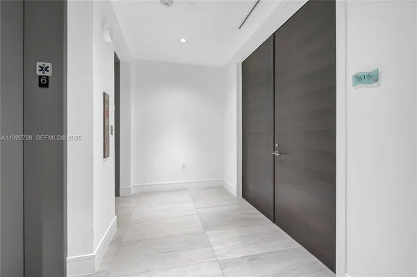 a view of hallway with shower