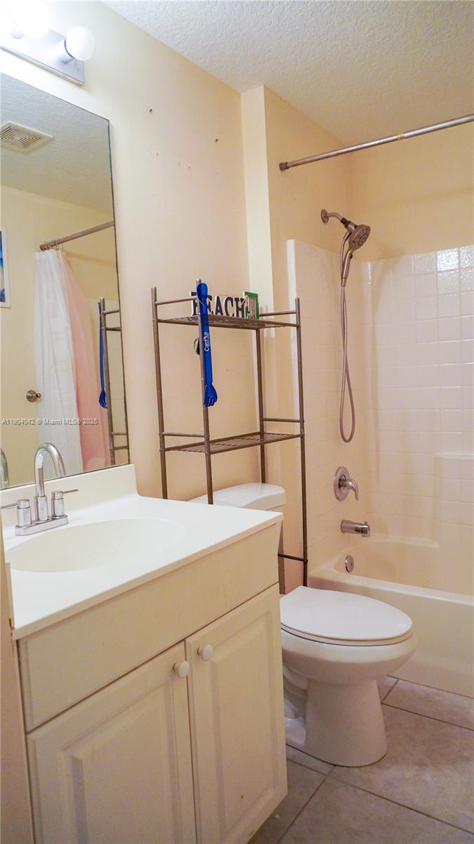 1496 24th Avenue Southwest Vero Beach, FL 32962 - Photo 15 of 21 a bathroom with a sink a toilet and shower