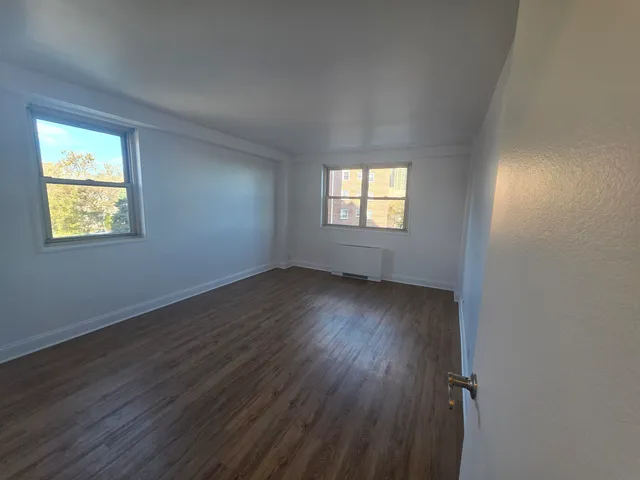 an empty room with windows