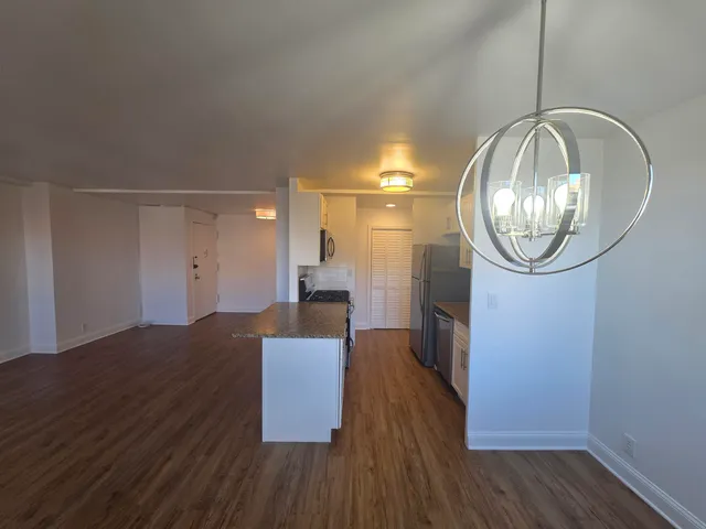 a view of livingroom with furniture wooden floor and window