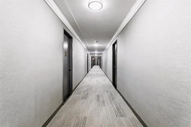 a view of a swimming pool with outdoor seating