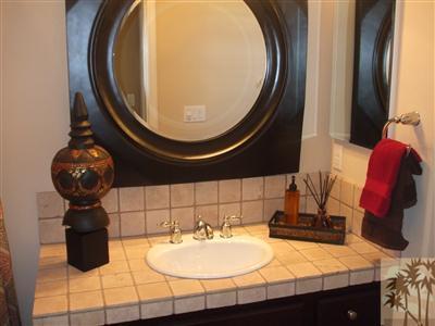 81910 Eagle Claw Drive La Quinta, CA 92253 - Photo 10 of 21 a bathroom with a sink and a mirror