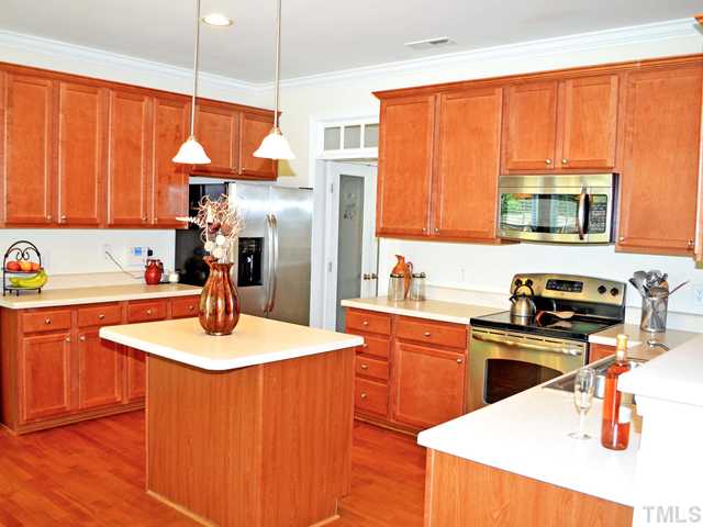3951 Patriot Ridge Court Raleigh, NC 27610 - Photo 5 of 18 Island Kitchen w/ 42" Caninets, Stainless Appliances & Hardwoods!