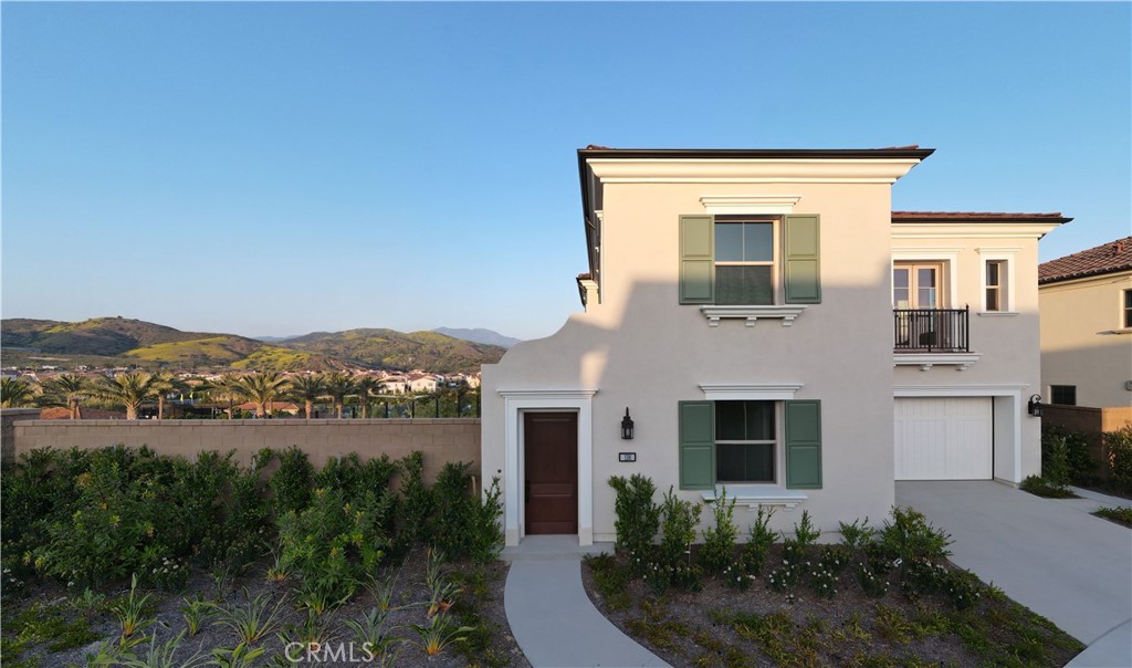 138 Oakstone Irvine, CA 92618 - Photo 1 of 1 a front view of a house with mountain view