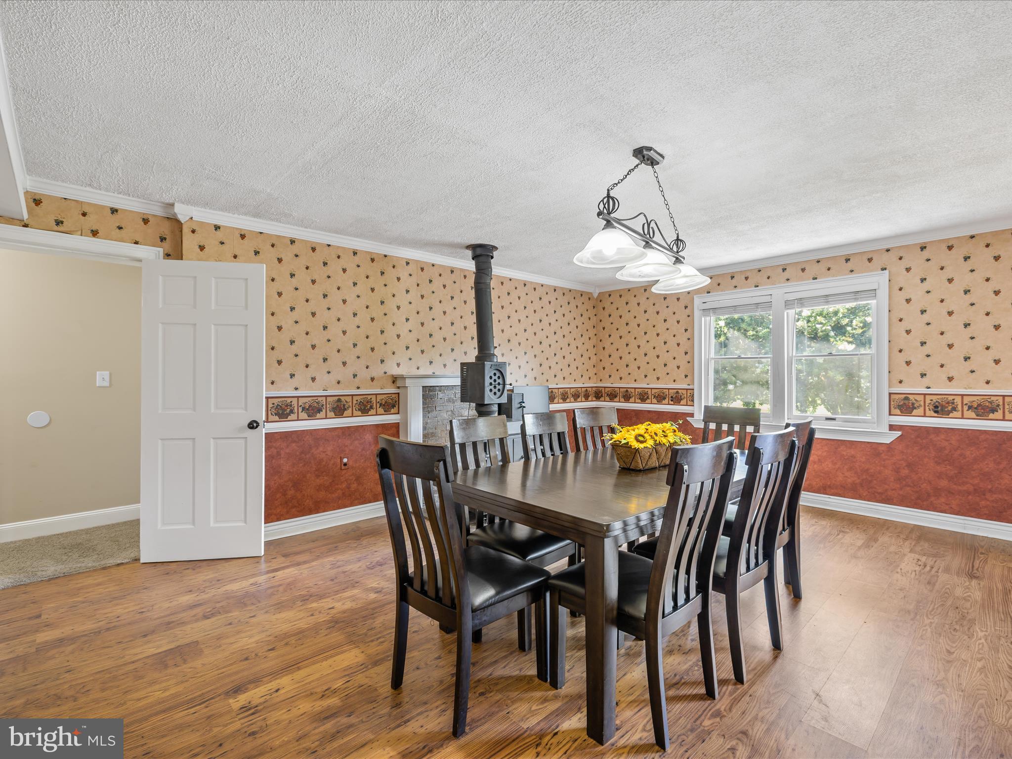 28495 Fire Tower Road Laurel, DE 19956 - Photo 15 of 31 a dining room with furniture window and wooden floor