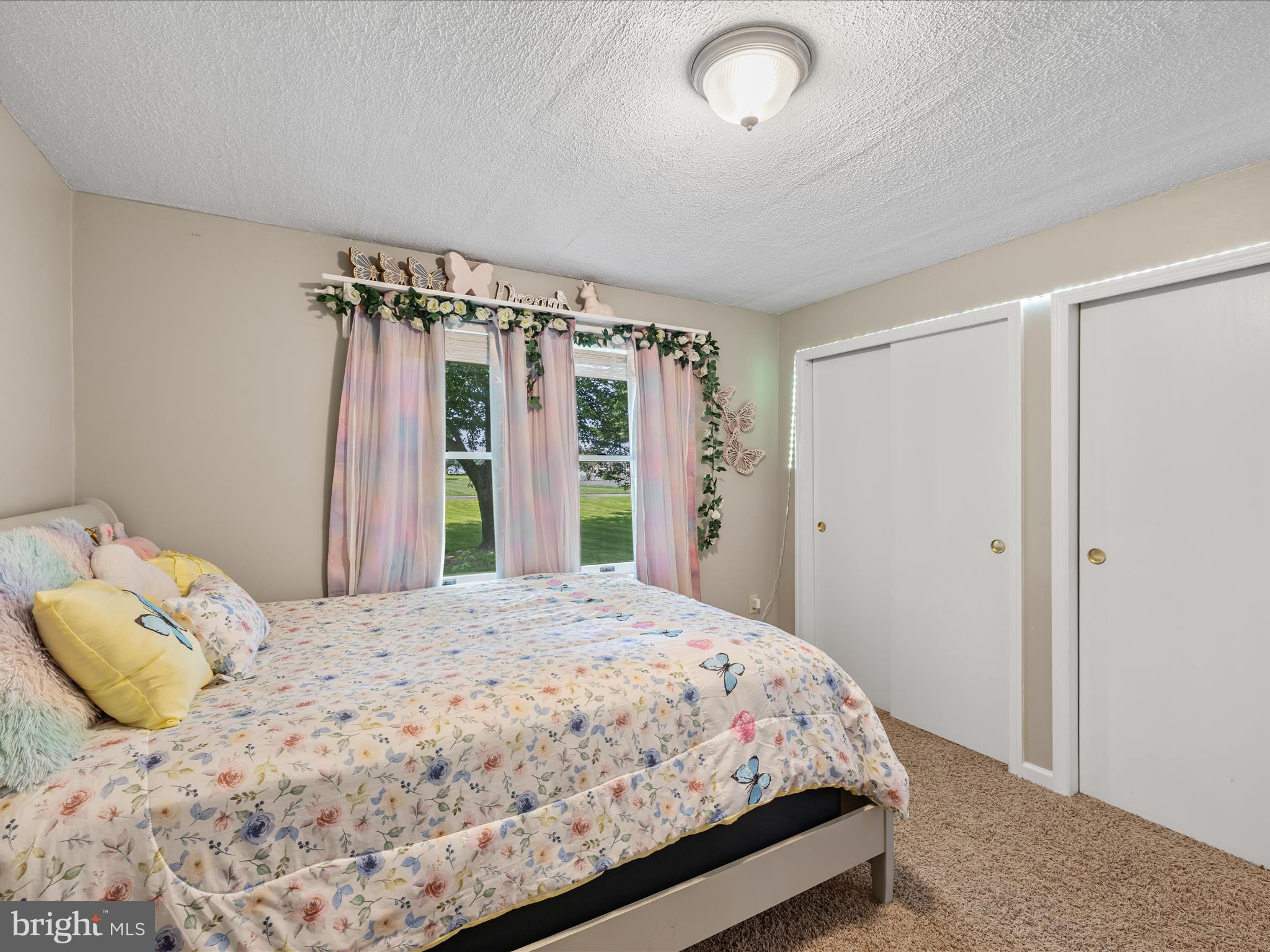28495 Fire Tower Road Laurel, DE 19956 - Photo 20 of 31 a bedroom with a bed and a closet