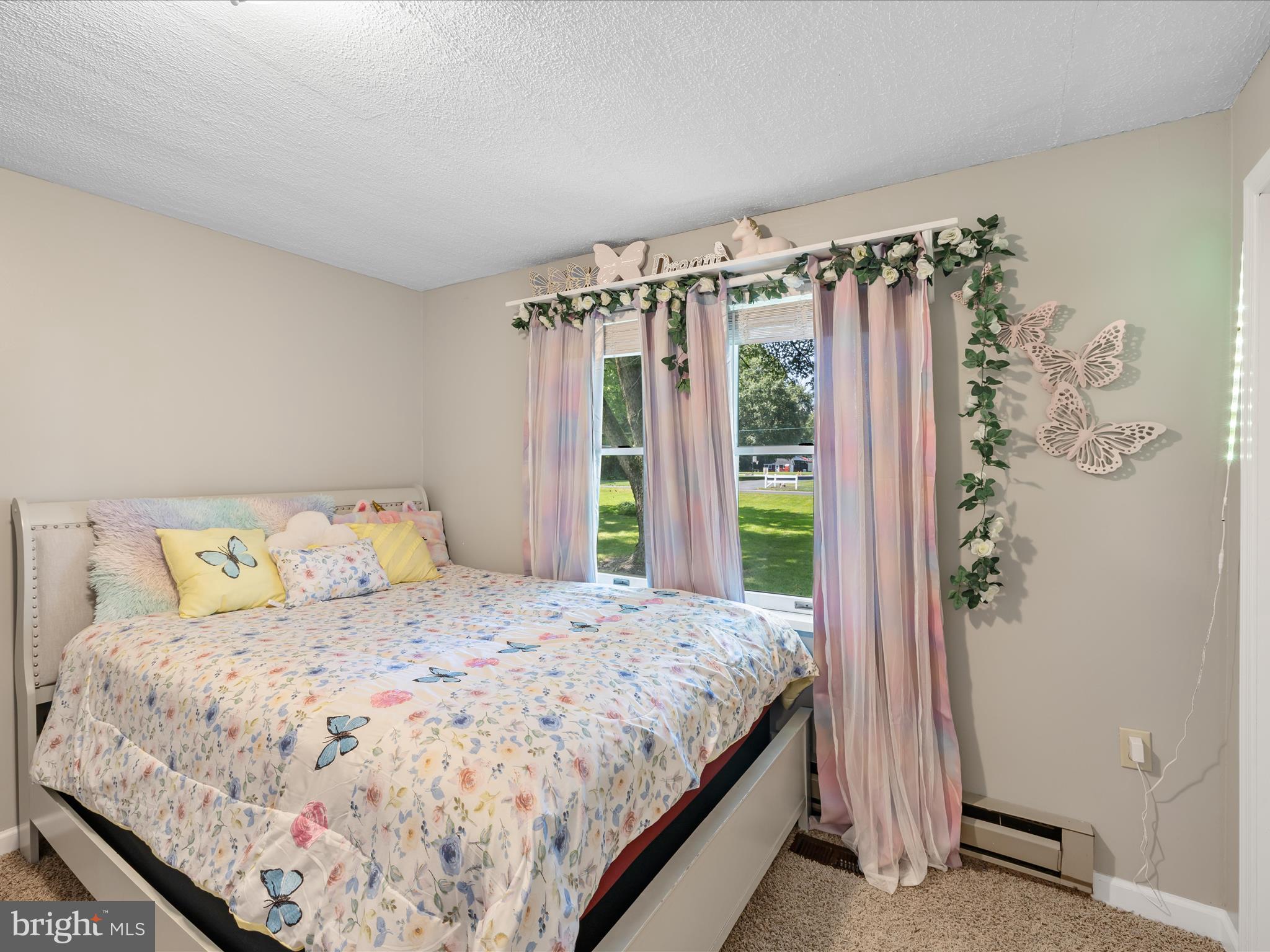 28495 Fire Tower Road Laurel, DE 19956 - Photo 21 of 31 a bedroom with a bed and a window