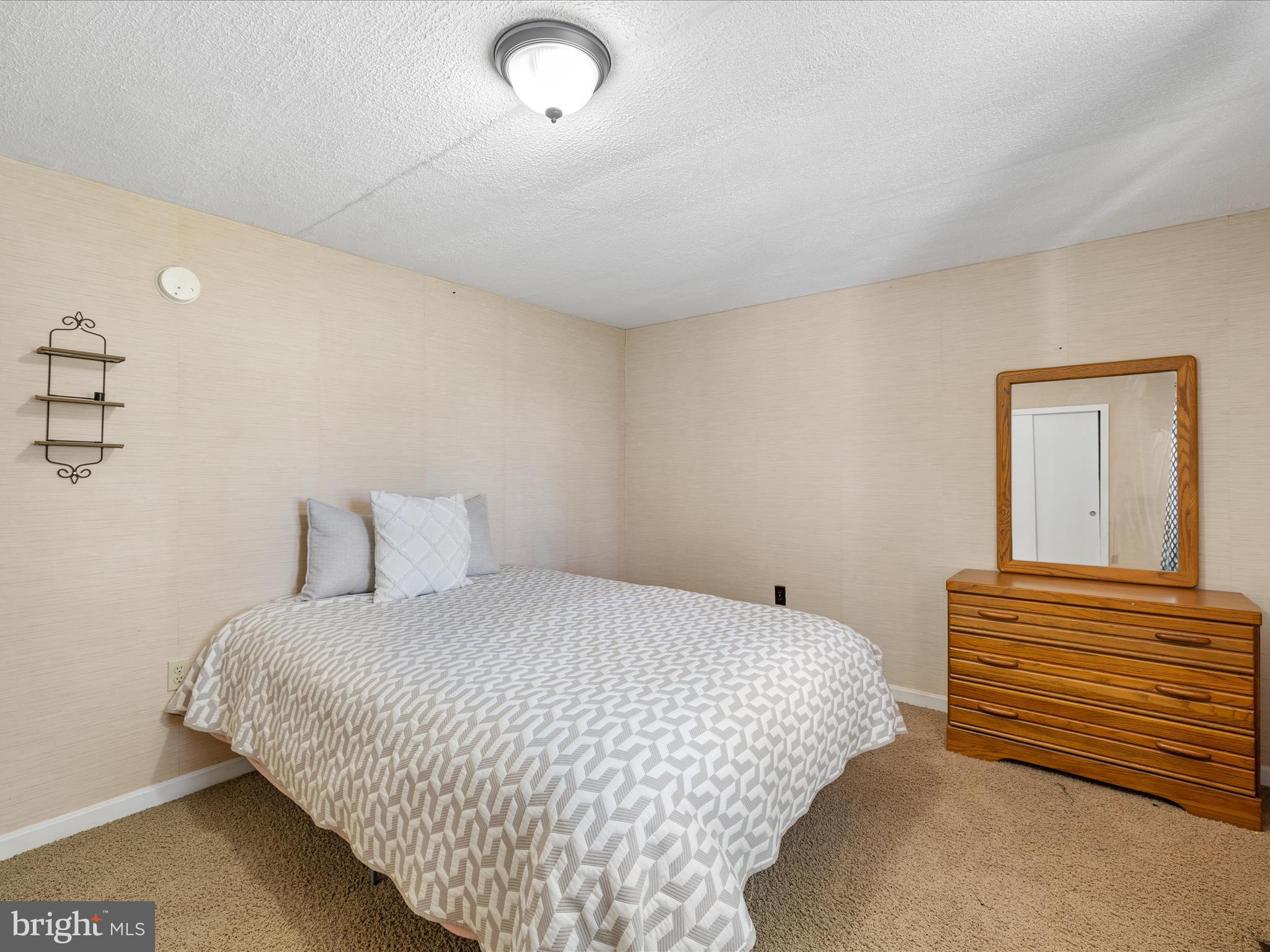 28495 Fire Tower Road Laurel, DE 19956 - Photo 26 of 31 a bedroom with a bed and closet