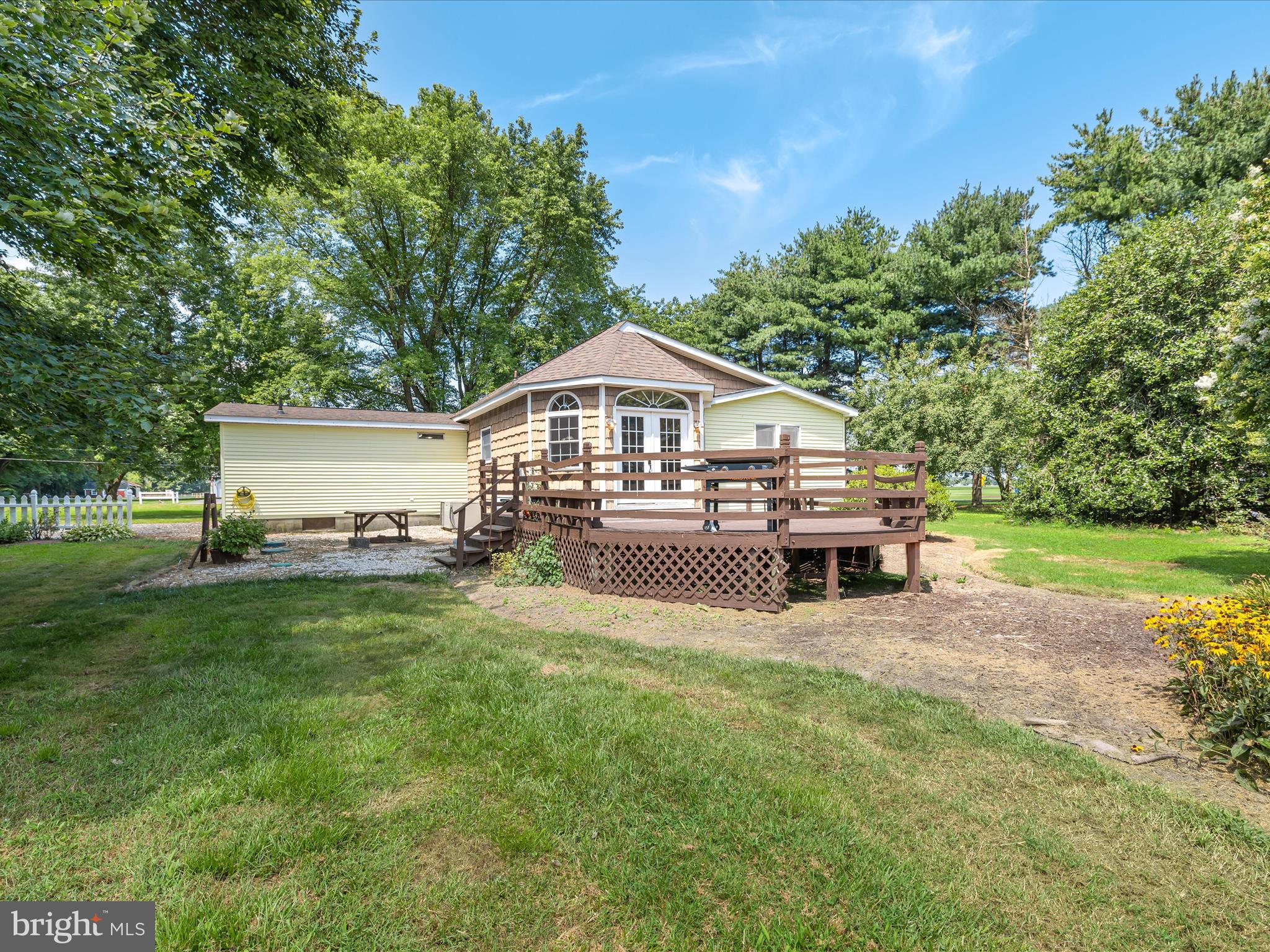 28495 Fire Tower Road Laurel, DE 19956 - Photo 29 of 31 a view of a house with a yard and sitting area