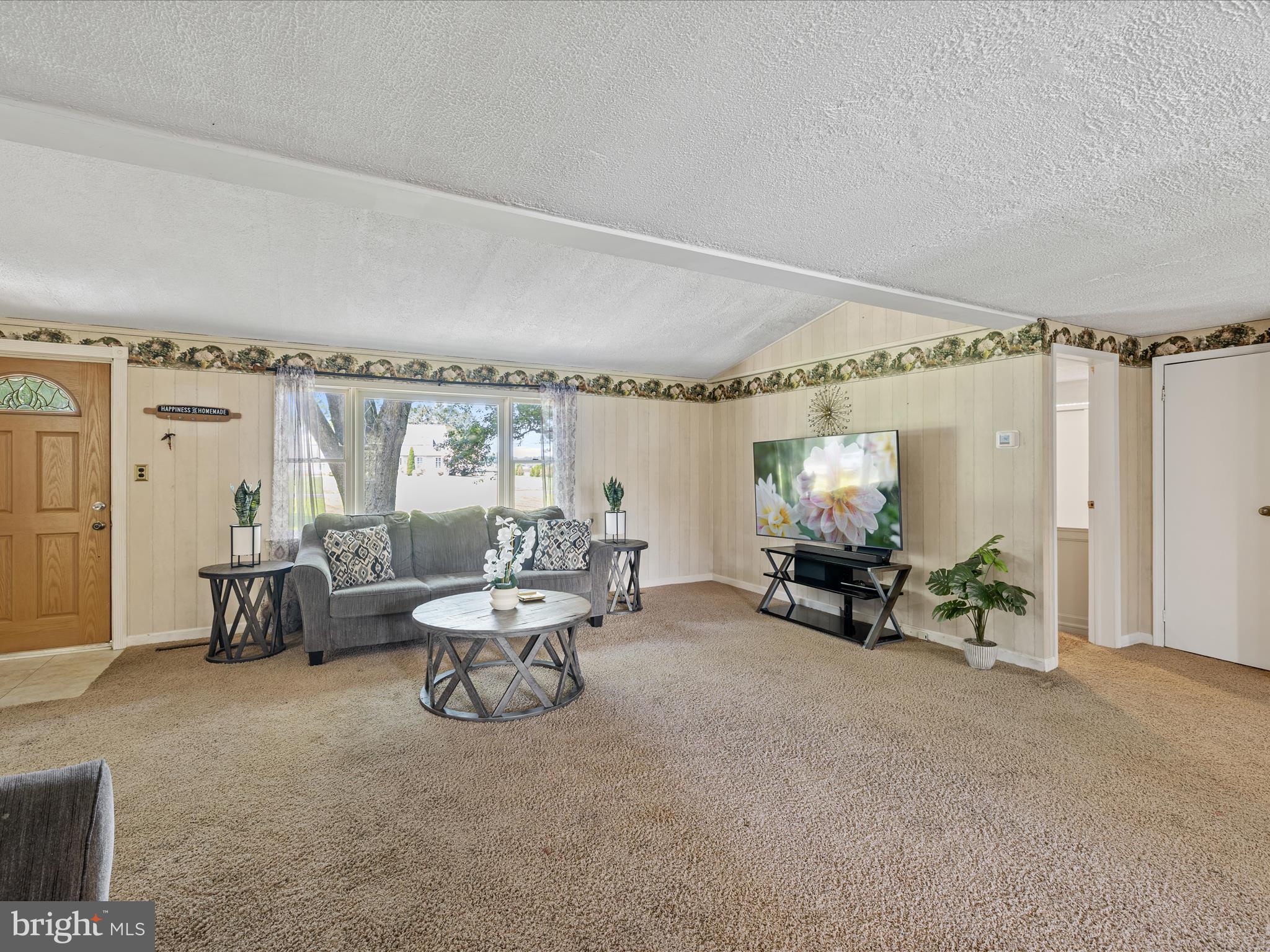 28495 Fire Tower Road Laurel, DE 19956 - Photo 4 of 31 a living room with furniture and a large window
