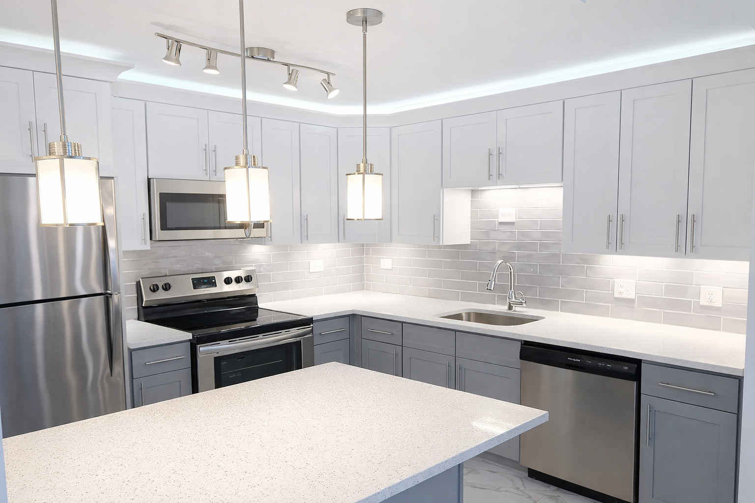 6301 North Sheridan Road, Unit 11C Chicago, IL 60660 - Photo 6 of 19 a kitchen with stainless steel appliances a stove a sink a microwave a center island and cabinets