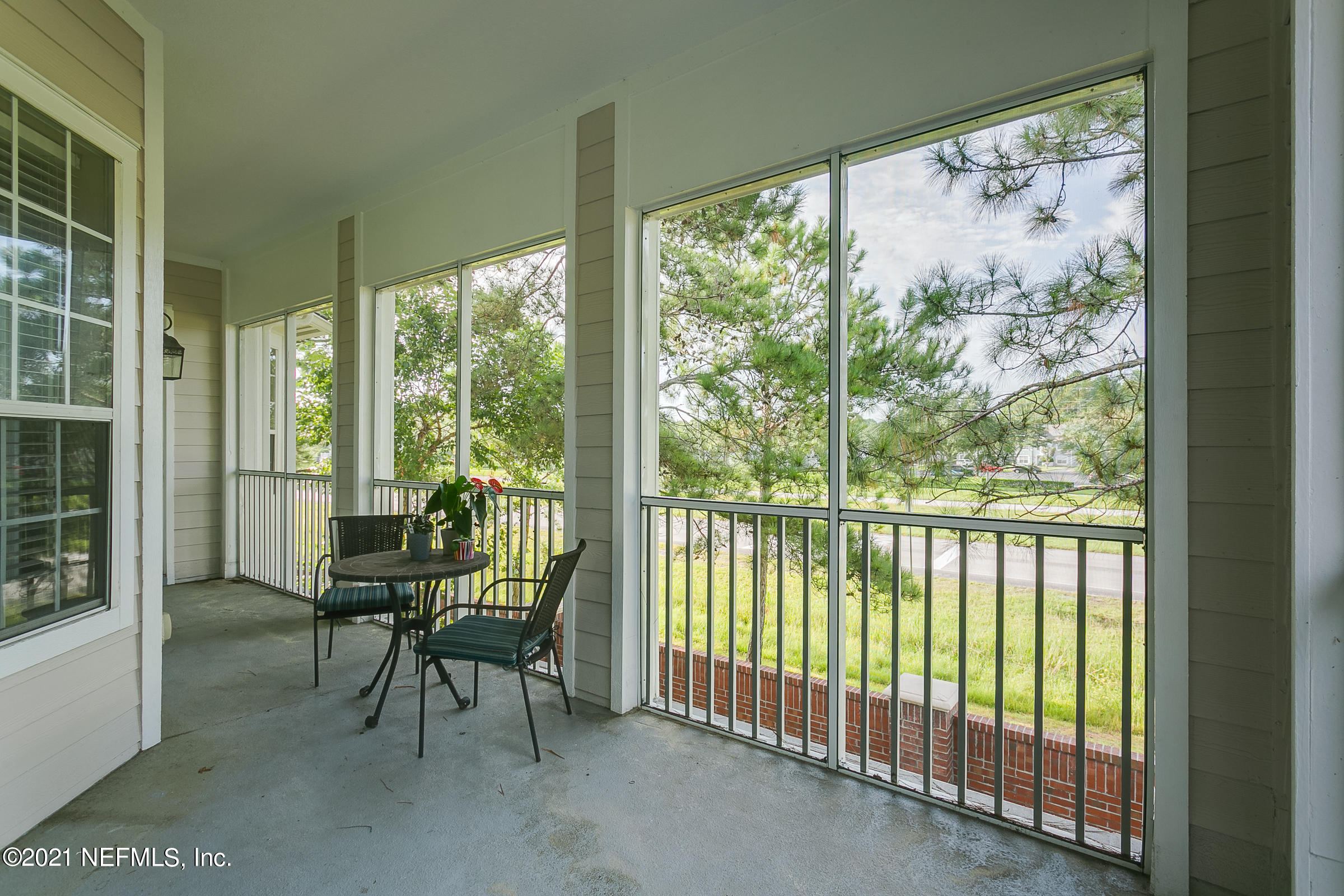 2011 Pond Ridge Court, Unit 1206 Fleming Island, FL 32003 - Photo 17 of 39 14-Screened-Balcony-View-1