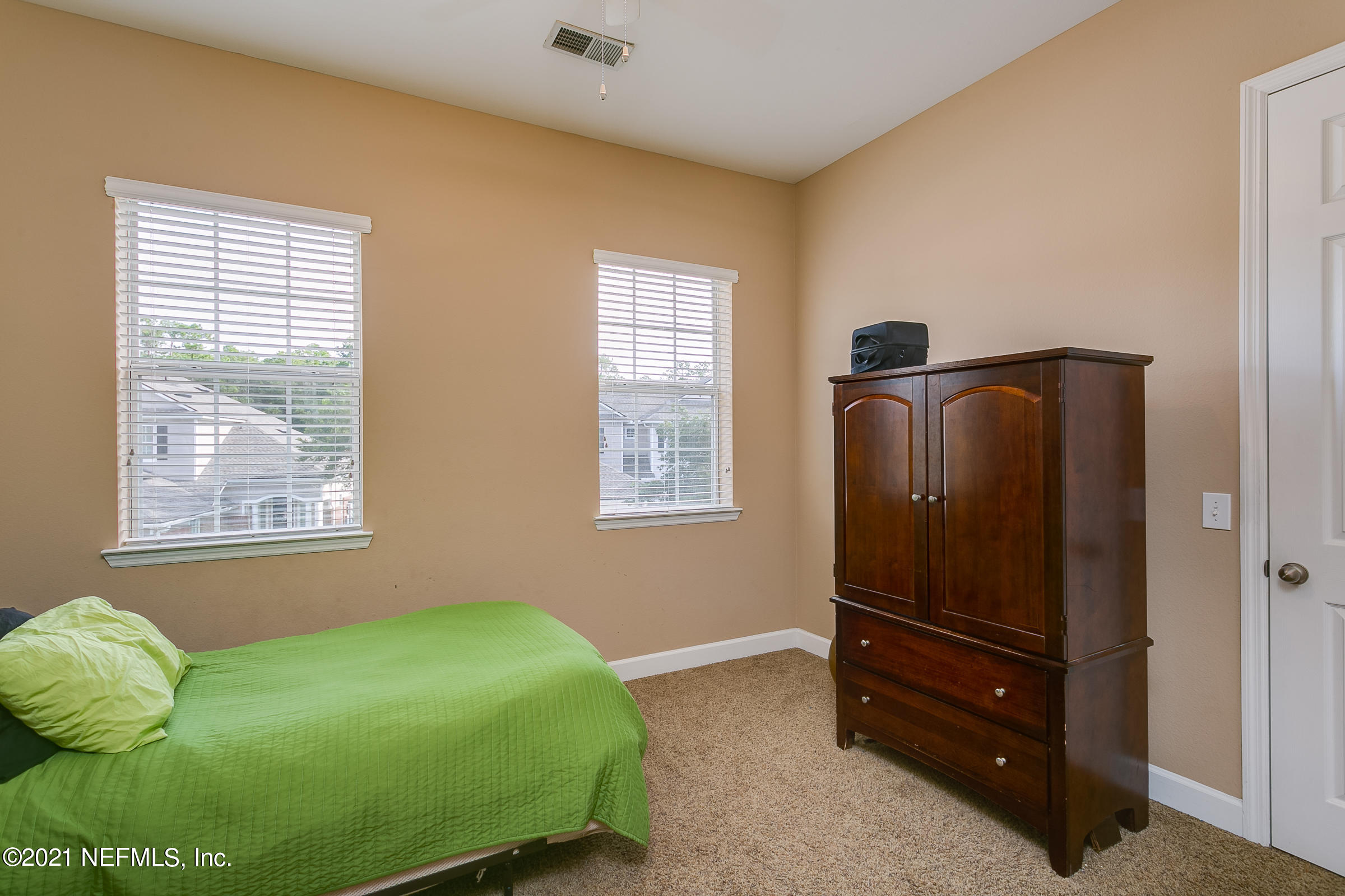 2011 Pond Ridge Court, Unit 1206 Fleming Island, FL 32003 - Photo 22 of 39 21-Bedroom-2-View-1