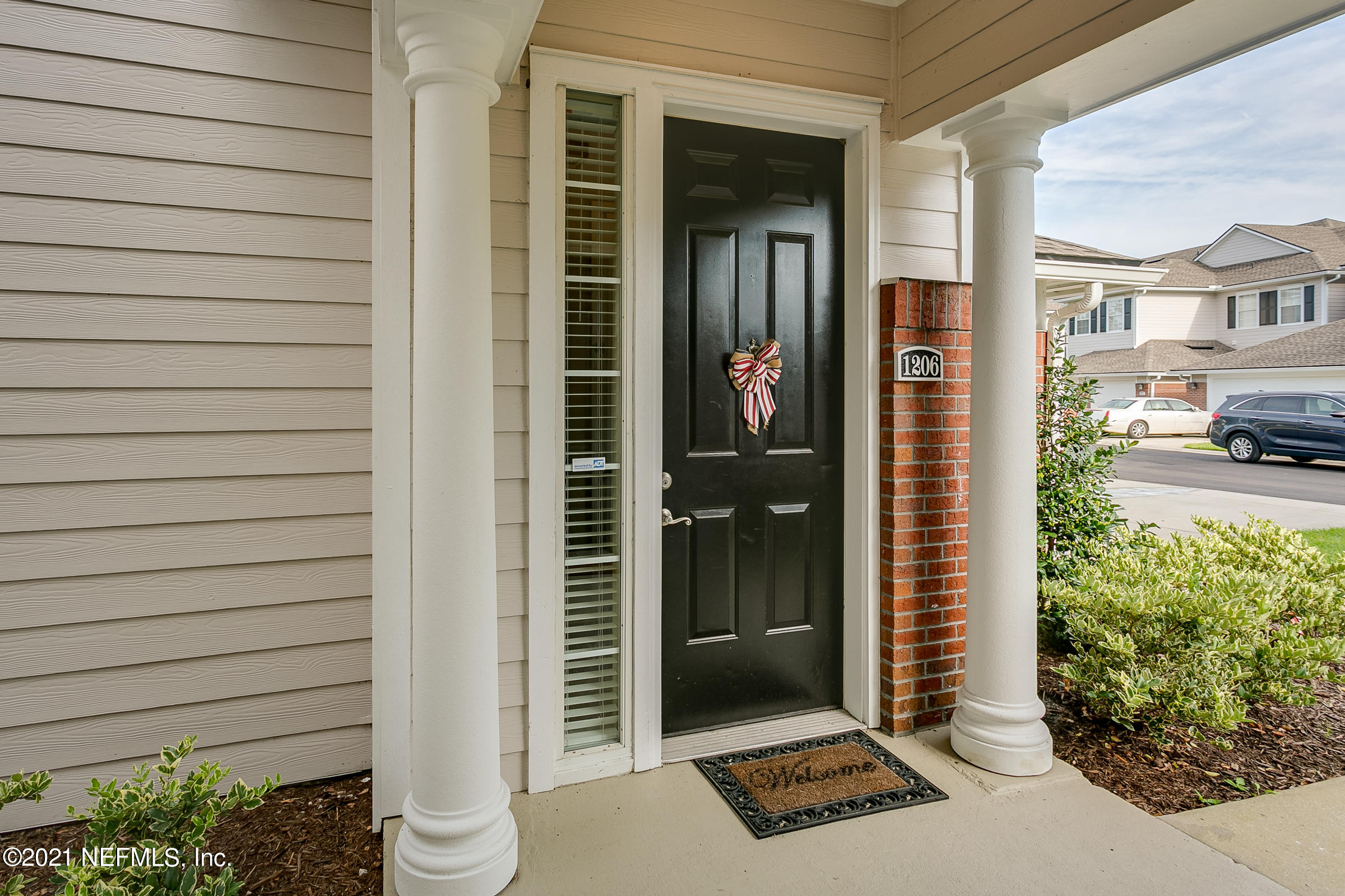 2011 Pond Ridge Court, Unit 1206 Fleming Island, FL 32003 - Photo 4 of 39 3-Front-Door
