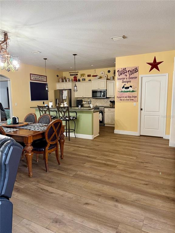 2361 Baltimore Street North Port, FL 34286 - Photo 12 of 40 a view of a kitchen and dining room