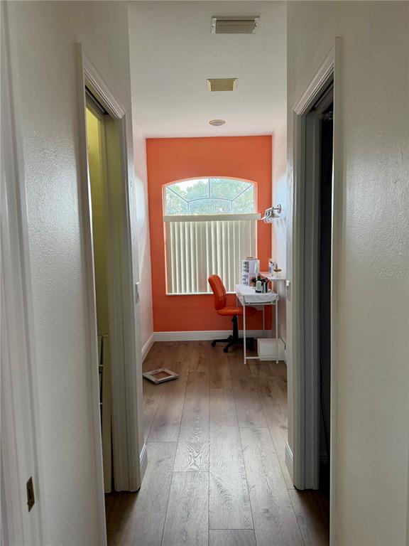 2361 Baltimore Street North Port, FL 34286 - Photo 19 of 40 a view of a room with lounge chair and windows