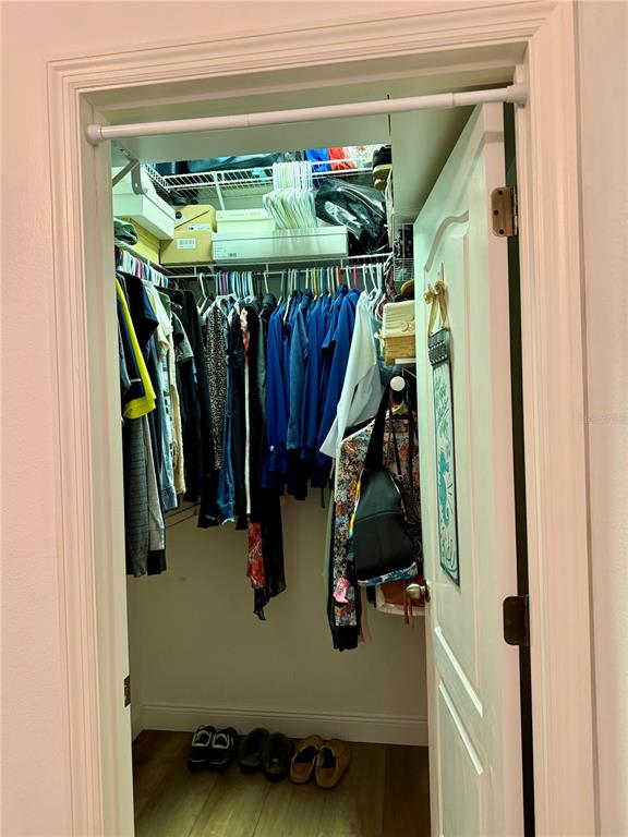 2361 Baltimore Street North Port, FL 34286 - Photo 21 of 40 a view of walk in closet with clothes and shoes