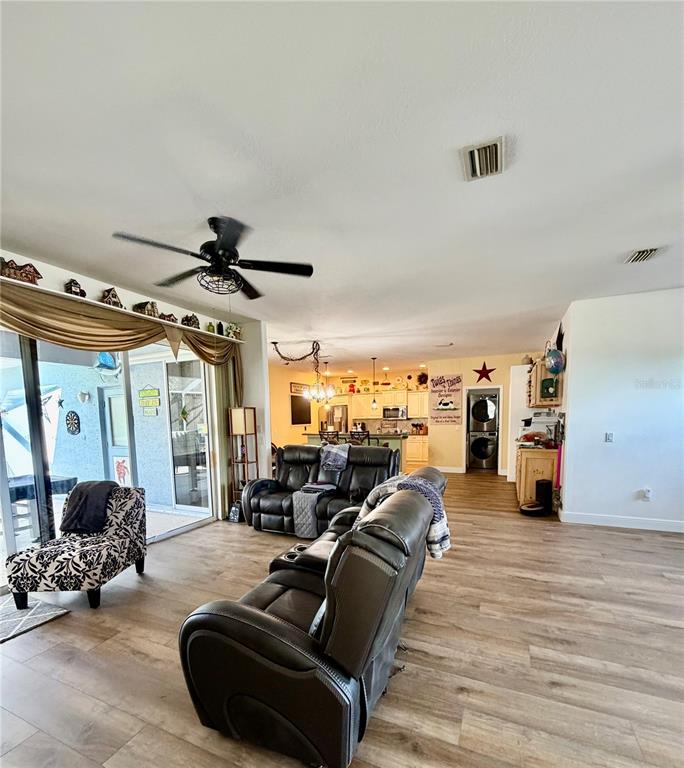 2361 Baltimore Street North Port, FL 34286 - Photo 7 of 40 a living room with furniture and a large window