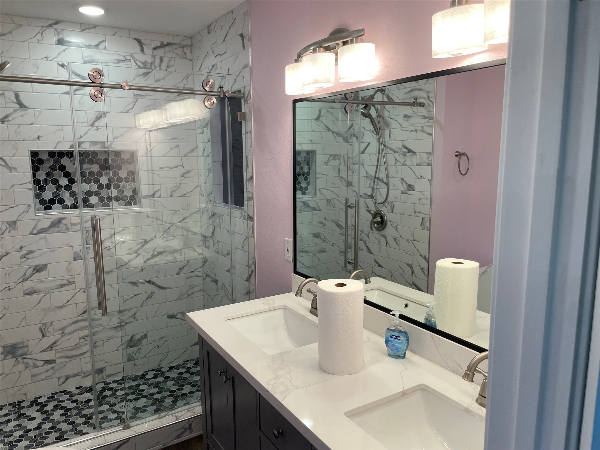 2709 Terry Street Houston, TX 77009 - Photo 11 of 23 a bathroom with a sink and a shower